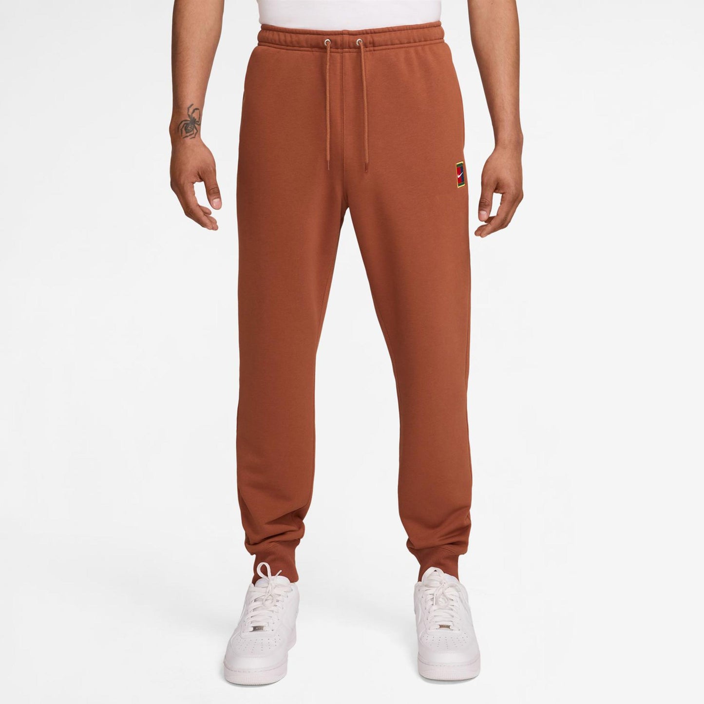 Nike Court Dri-Fit Heritage Fleece Pantalone Da Allenamento Uomini-Ruggine