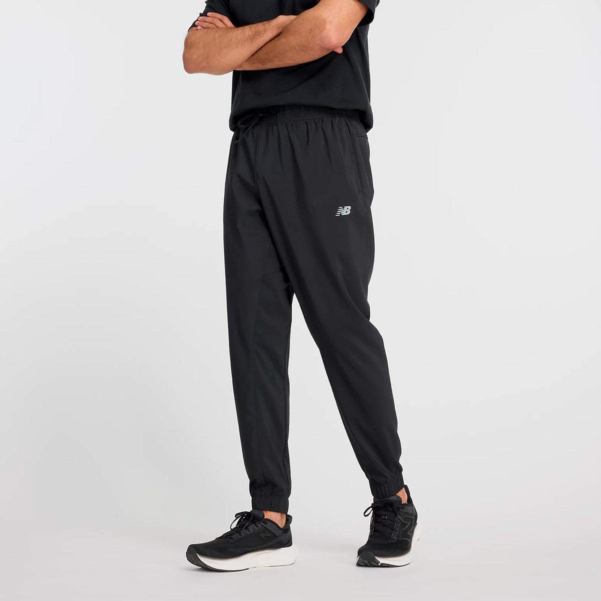 New Balance Essentials Woven Pantalone da allenamento Uomini - nero